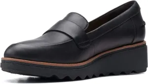 Clarks womens Sharon Gracie Penny Loafer, Black Leather With Dark Tan Welt, 5 US